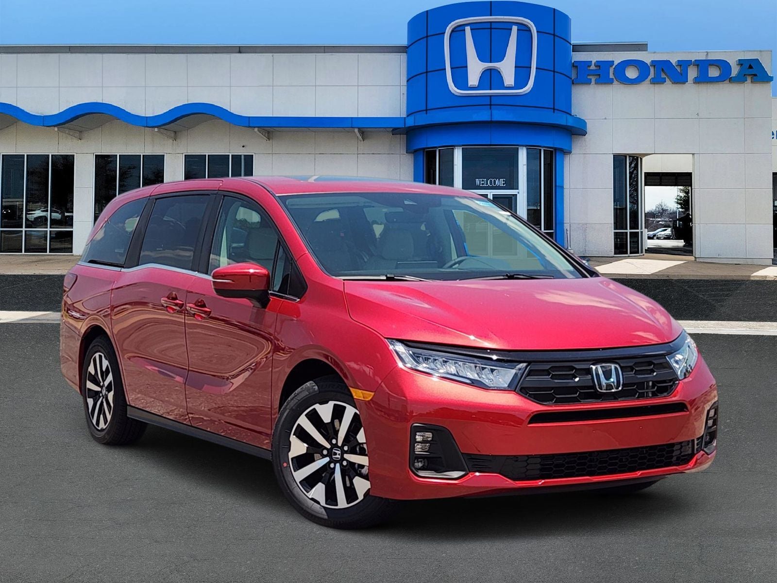 2026 Honda Odyssey EX-L in Radiant Red Metallic II — front three-quarter view
