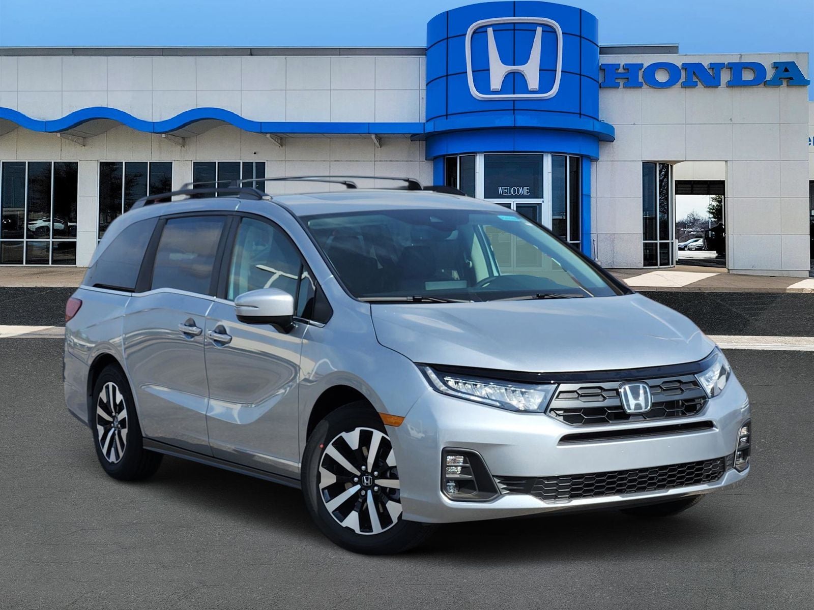2026 Honda Odyssey EX-L in Solar Silver Metallic — front three-quarter view