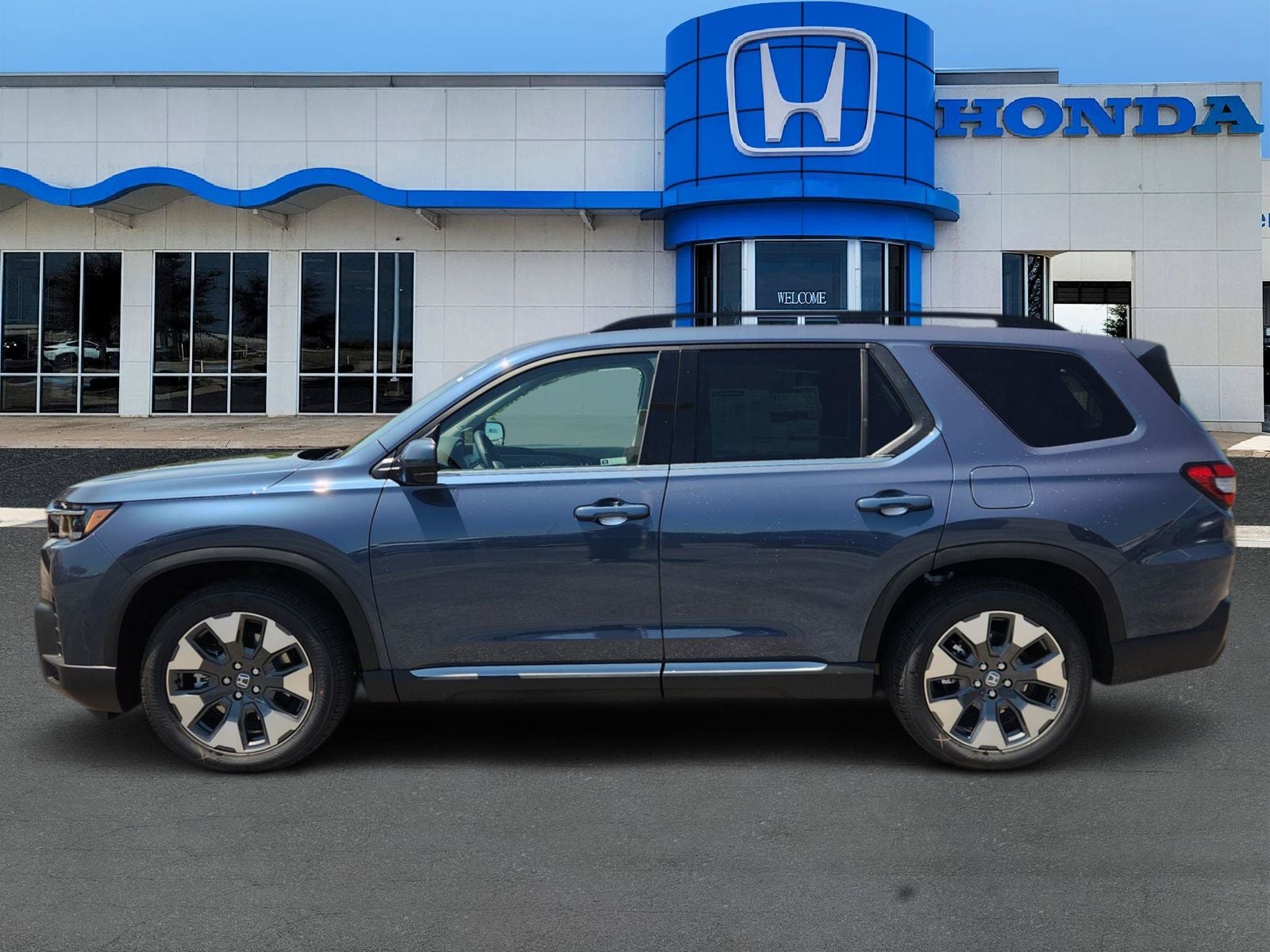 2026 Honda Pilot — rear three-quarter view