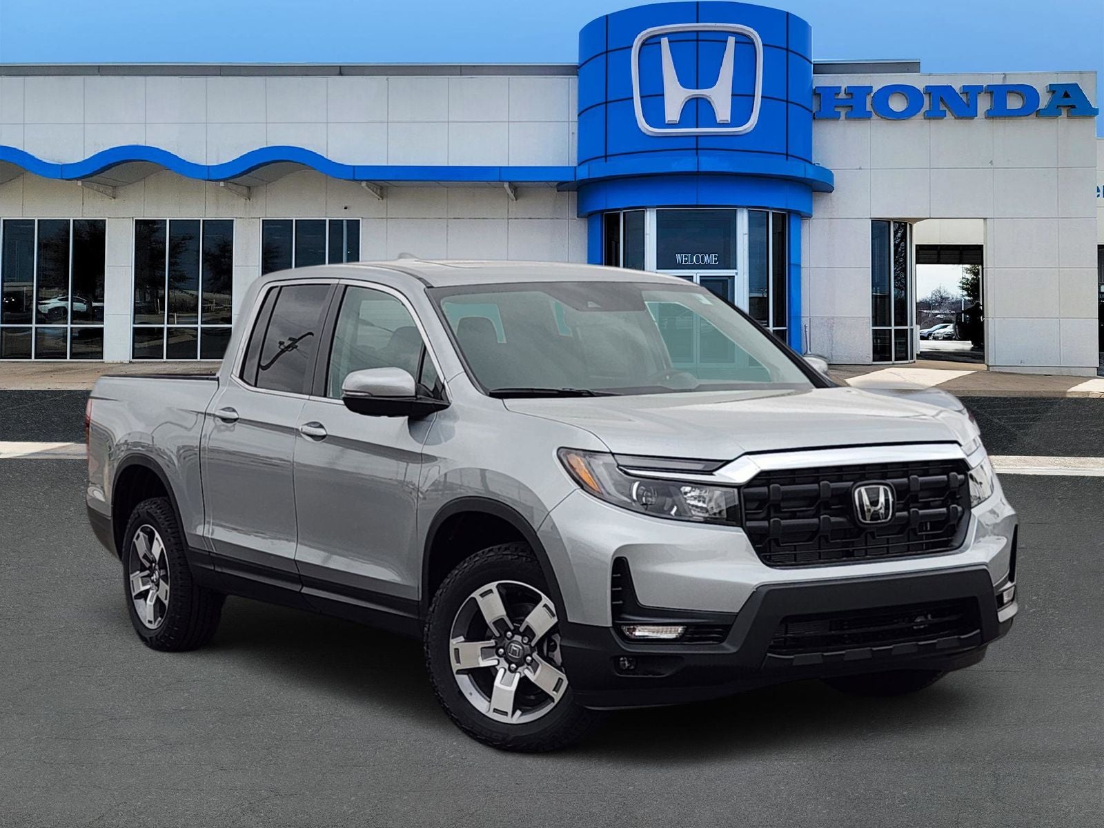 2026 Honda Ridgeline RTL in Solar Silver Metallic — front three-quarter view